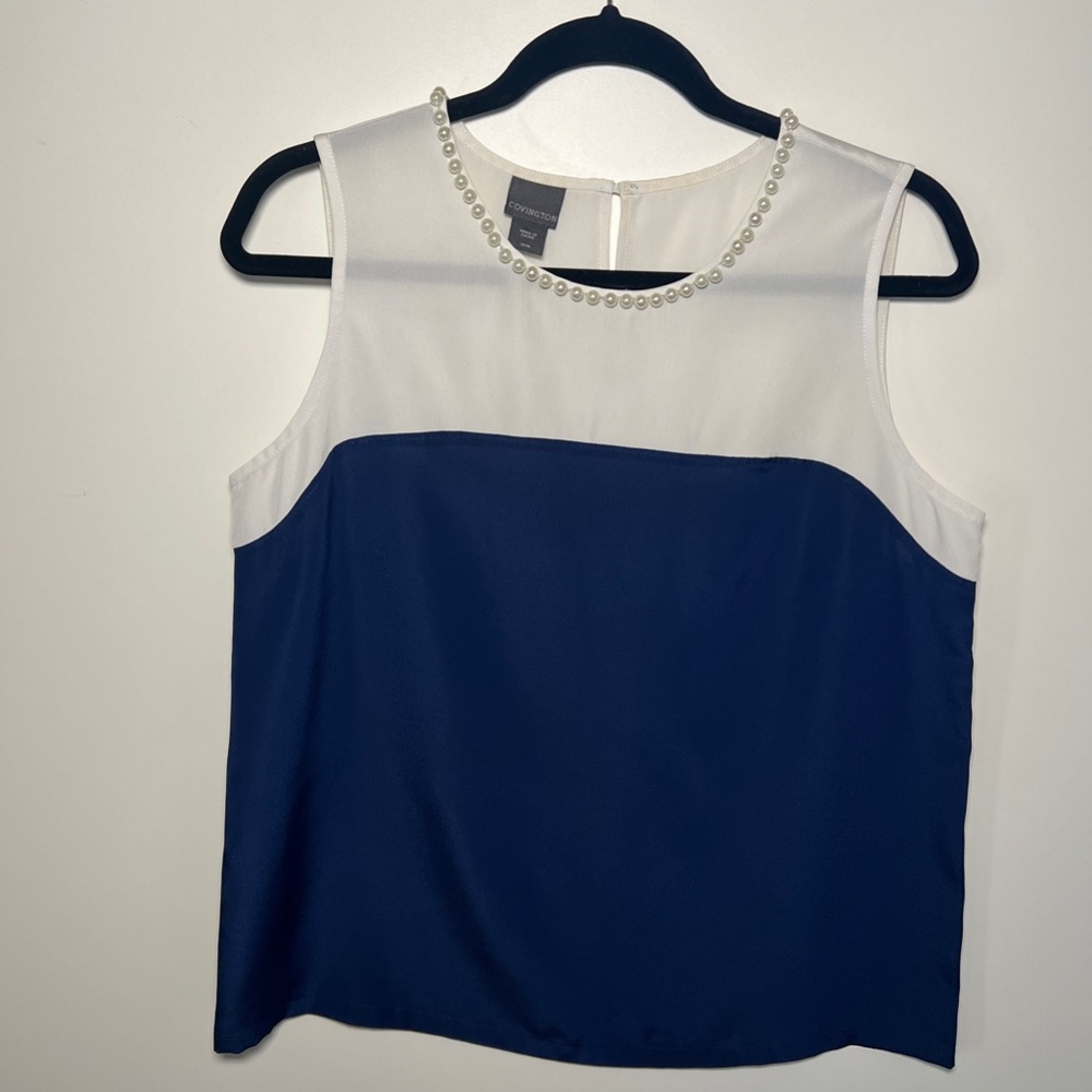 Covington size M
Pearl white and blue blouse 
Made in China
100% polyester